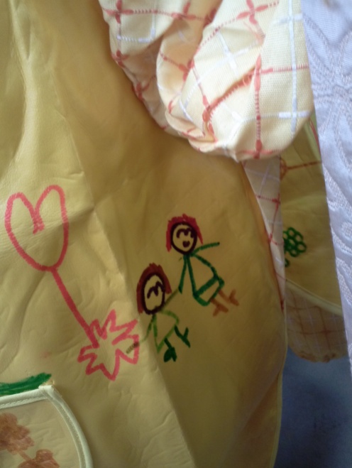 Lilly's art smock. That's me with my "beautiful red hair." NBD